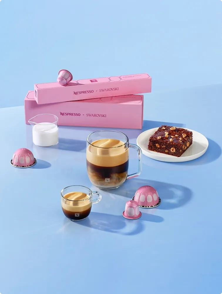 Hazelnut Brownie flavored coffee capsules and cups from the Nespresso x Swarovski collection
