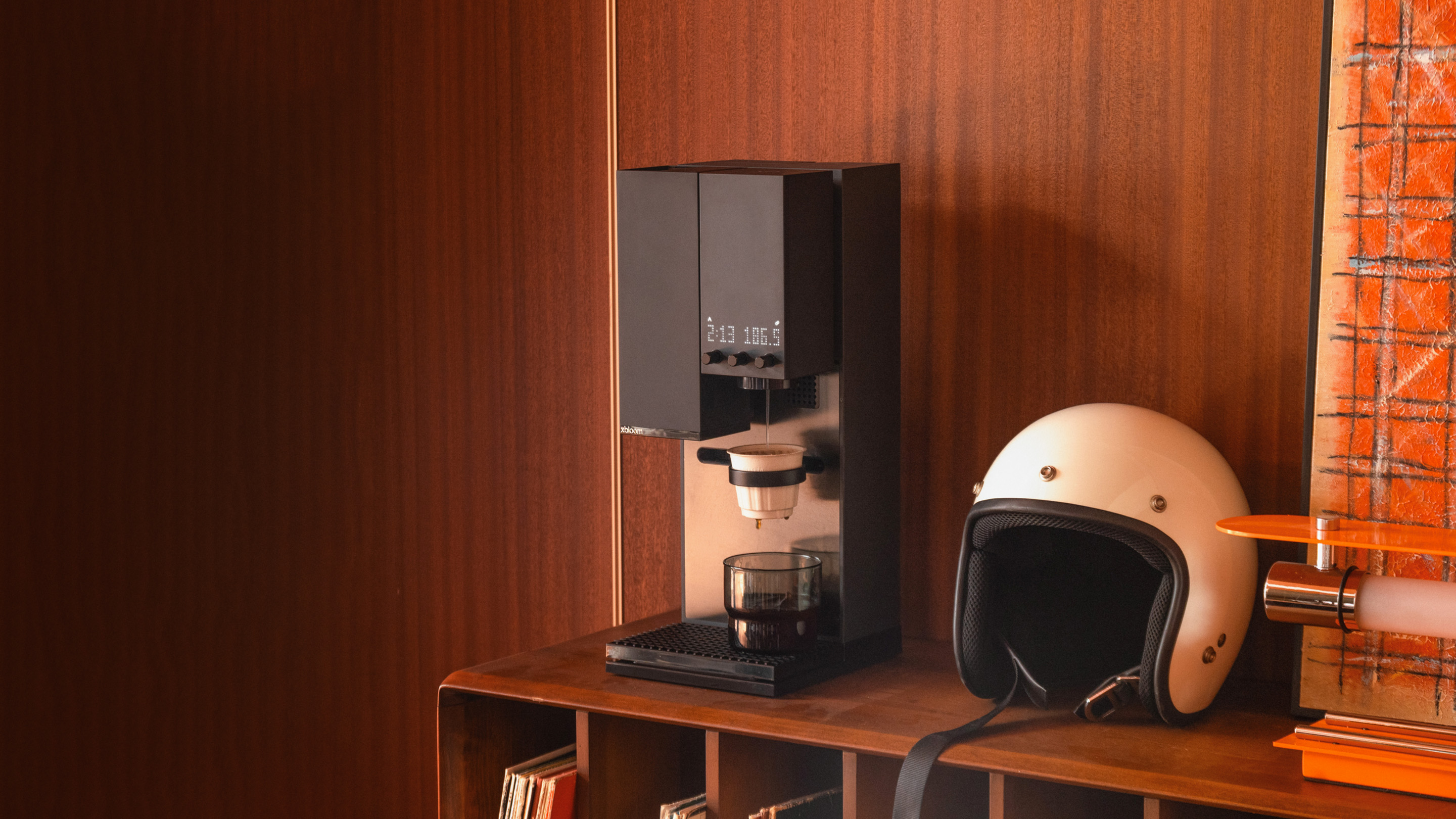 Black xBloom Studio preparing coffee on a wooden cabinet